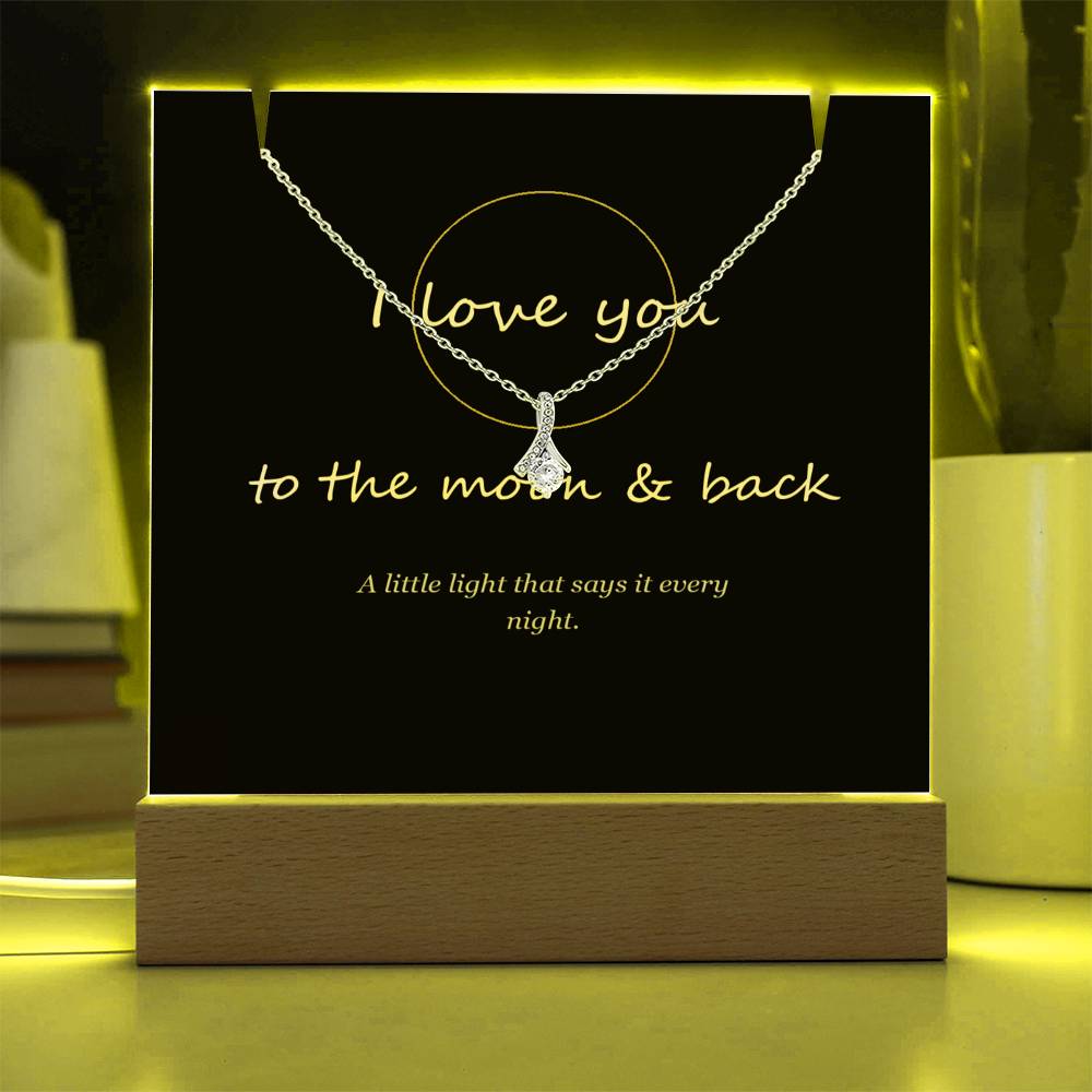 Keepsake light glowing yellow | To the Moon & Back Keepsake Light & Necklace