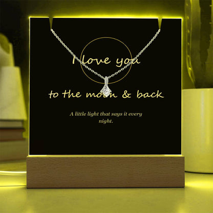 Keepsake light glowing yellow | To the Moon & Back Keepsake Light & Necklace