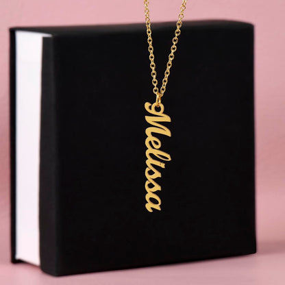 Gold finish vertical name pendant on a black gift box | Stacked Vertical Names Necklace