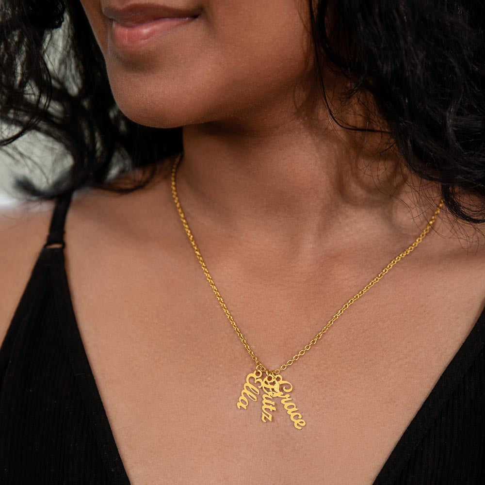 Three gold finish vertical names worn, close-up | Stacked Vertical Names Necklace