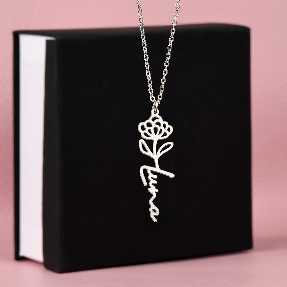 Silver birth flower name pendant on a black gift box | Flower Name Necklace