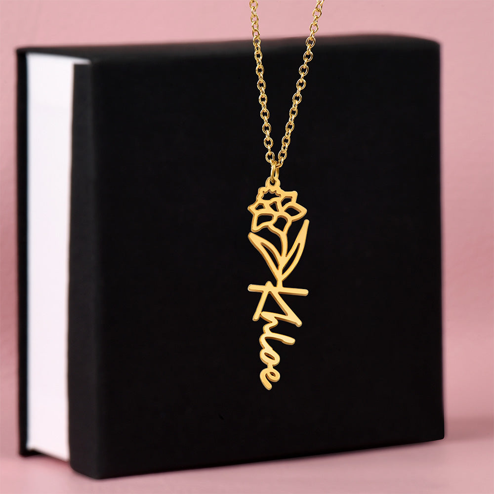 Gold finish birth flower name pendant on a black gift box | Flower Name Necklace