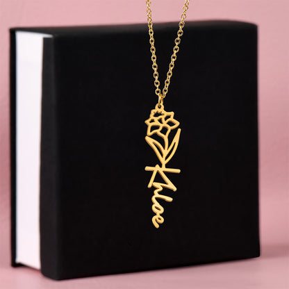 Gold finish birth flower name pendant on a black gift box | Flower Name Necklace
