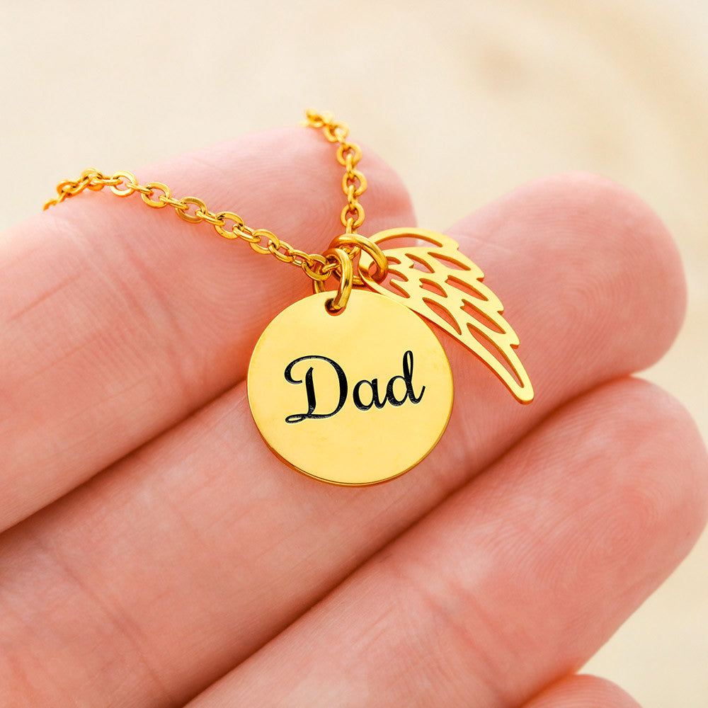 Gold finish Dad disc and wing charm held between the fingers | Memorial Necklace for Dad