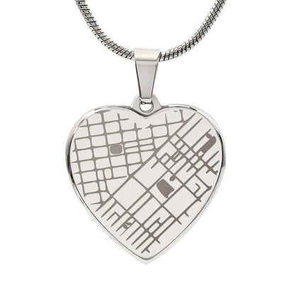 Steel heart pendant engraved with a street map, on a white background | Engraved Coordinates Heart Necklace