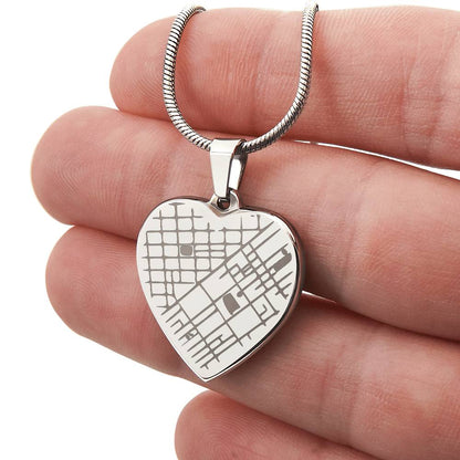 Hand holding the steel map heart pendant | Engraved Coordinates Heart Necklace
