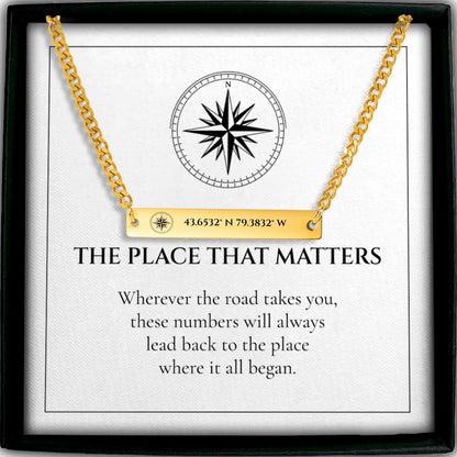 Personalized coordinates Cuban bar necklace in gold on a THE PLACE THAT MATTERS card in a gift box