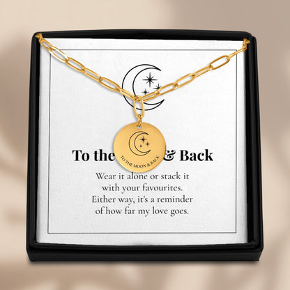 To the Moon and Back necklace displayed on its card in a black gift box