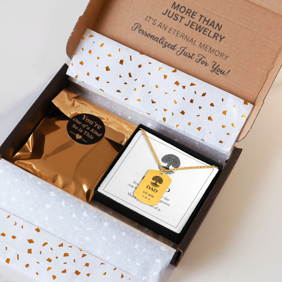 Dad Est. Year necklace packed in a kraft shipping box with tissue