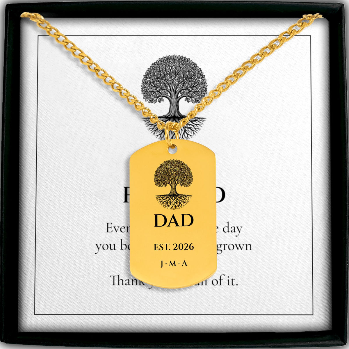 Personalized Dad Est. Year dog tag necklace in gold on a FOR DAD message card in a gift box