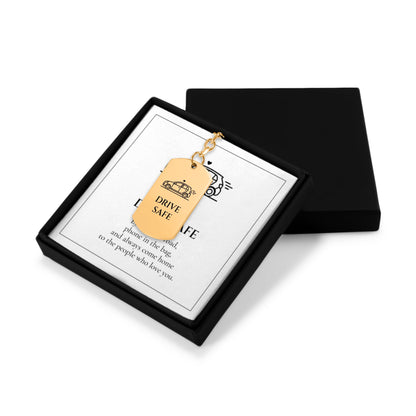 Drive Safe keychain in an open black gift box