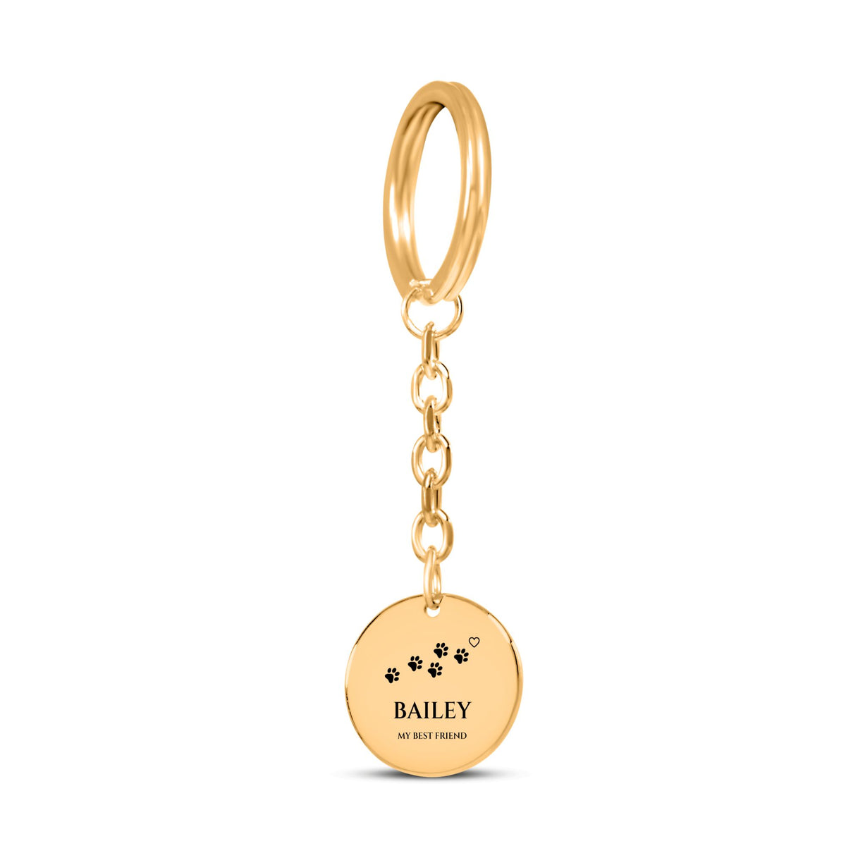 Gold coin keychain engraved with paw prints, the sample name BAILEY and MY BEST FRIEND