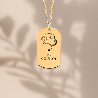 My Co-Pilot dog tag pendant close up with soft shadows