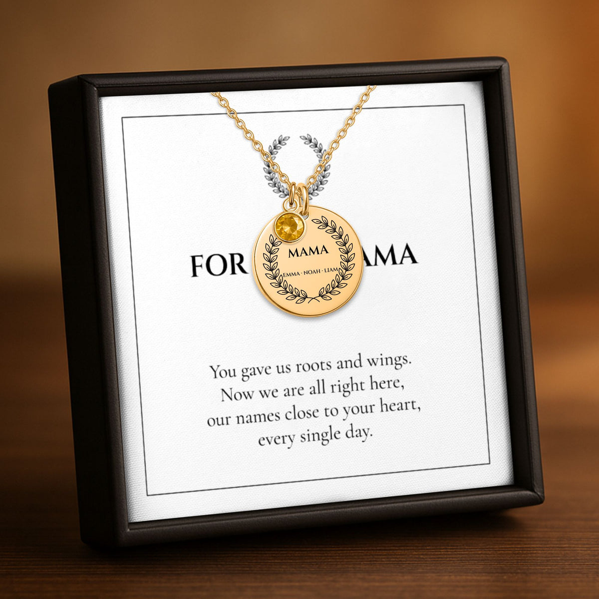 Personalized Mama birthstone coin necklace in gold on a FOR OUR MAMA card in a gift box