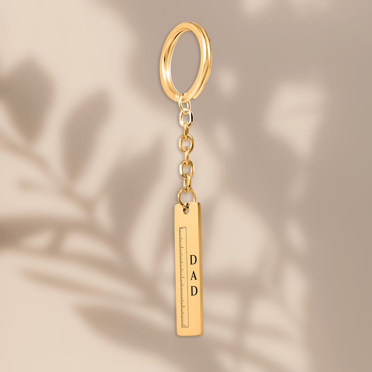 Dad ruler bar keychain with soft leaf shadows
