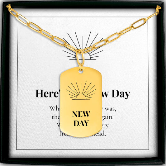 New Day sunrise tag necklace on a paperclip chain with its Here's to a New Day card