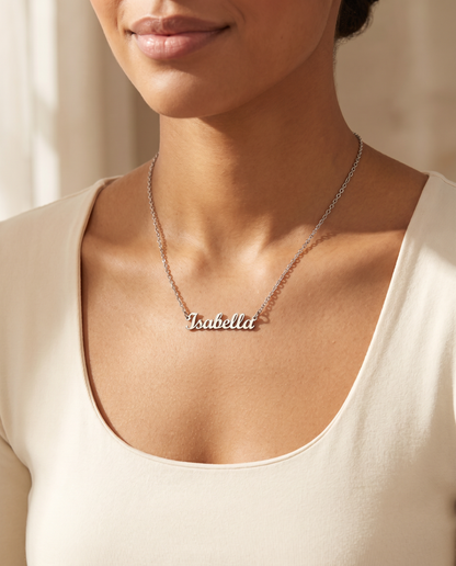 Woman wearing the polished steel name necklace at her collarbone | Custom Name Necklace