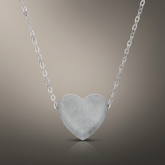 Engraved Heart Necklace on premium studio backdrop, high-contrast catalog shot