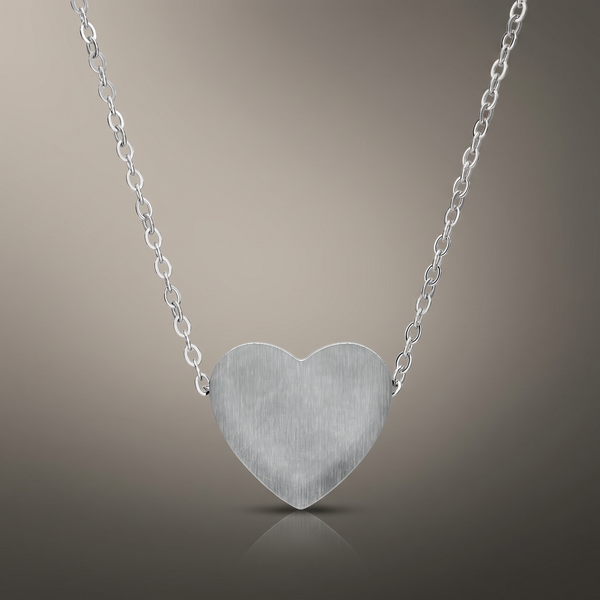 Engraved Heart Necklace on premium studio backdrop, high-contrast catalog shot