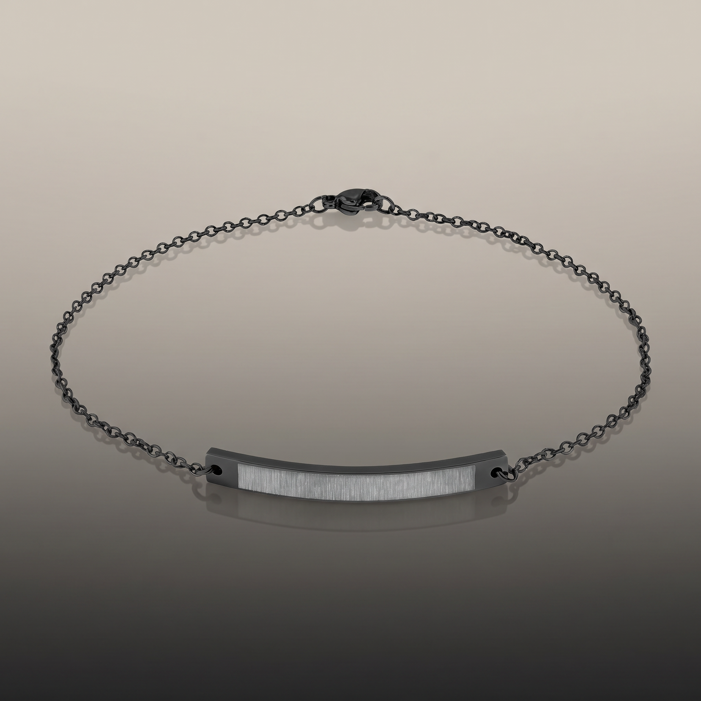 Engraved Curved Bar Anklet on premium studio backdrop, high-contrast catalog shot