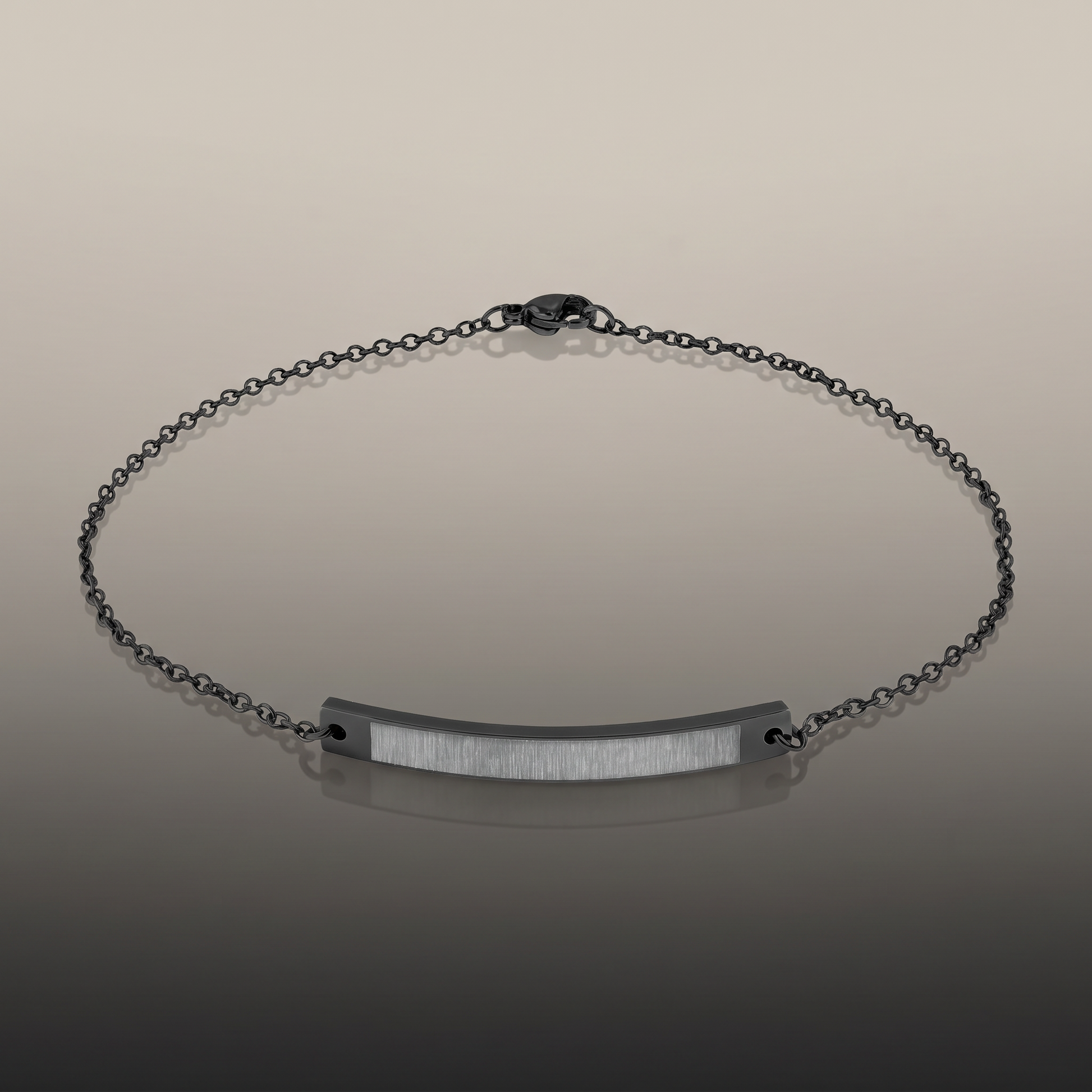 Engraved Curved Bar Anklet on premium studio backdrop, high-contrast catalog shot