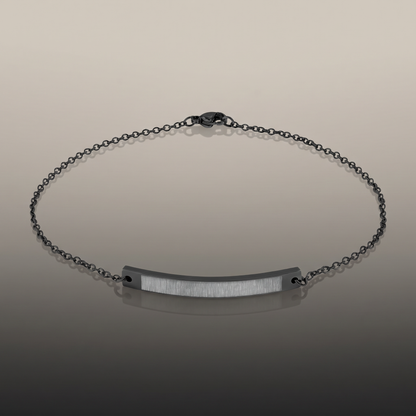 Engraved Curved Bar Anklet on premium studio backdrop, high-contrast catalog shot