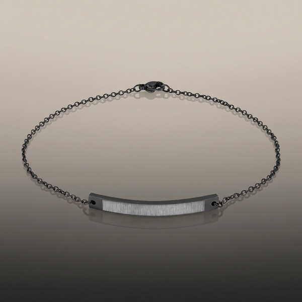 Engraved Curved Bar Anklet on premium studio backdrop, high-contrast catalog shot