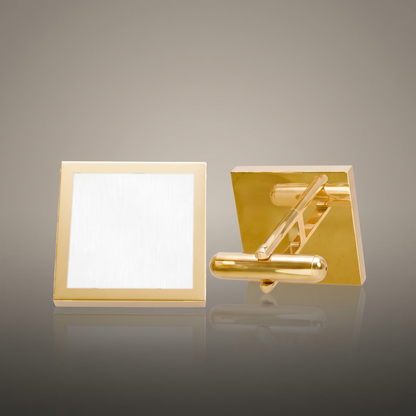Engraved Cufflinks on premium studio backdrop, high-contrast catalog shot