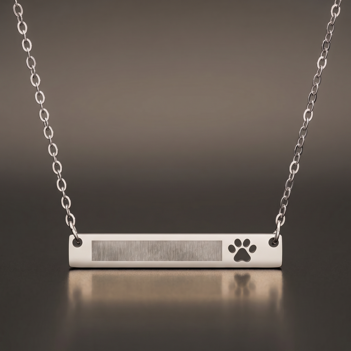 Engraved Paw Bar Necklace on premium studio backdrop, high-contrast catalog shot