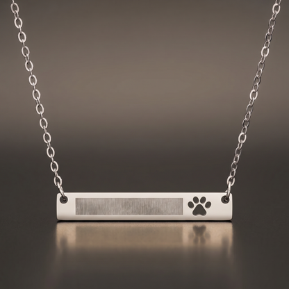 Engraved Paw Bar Necklace on premium studio backdrop, high-contrast catalog shot