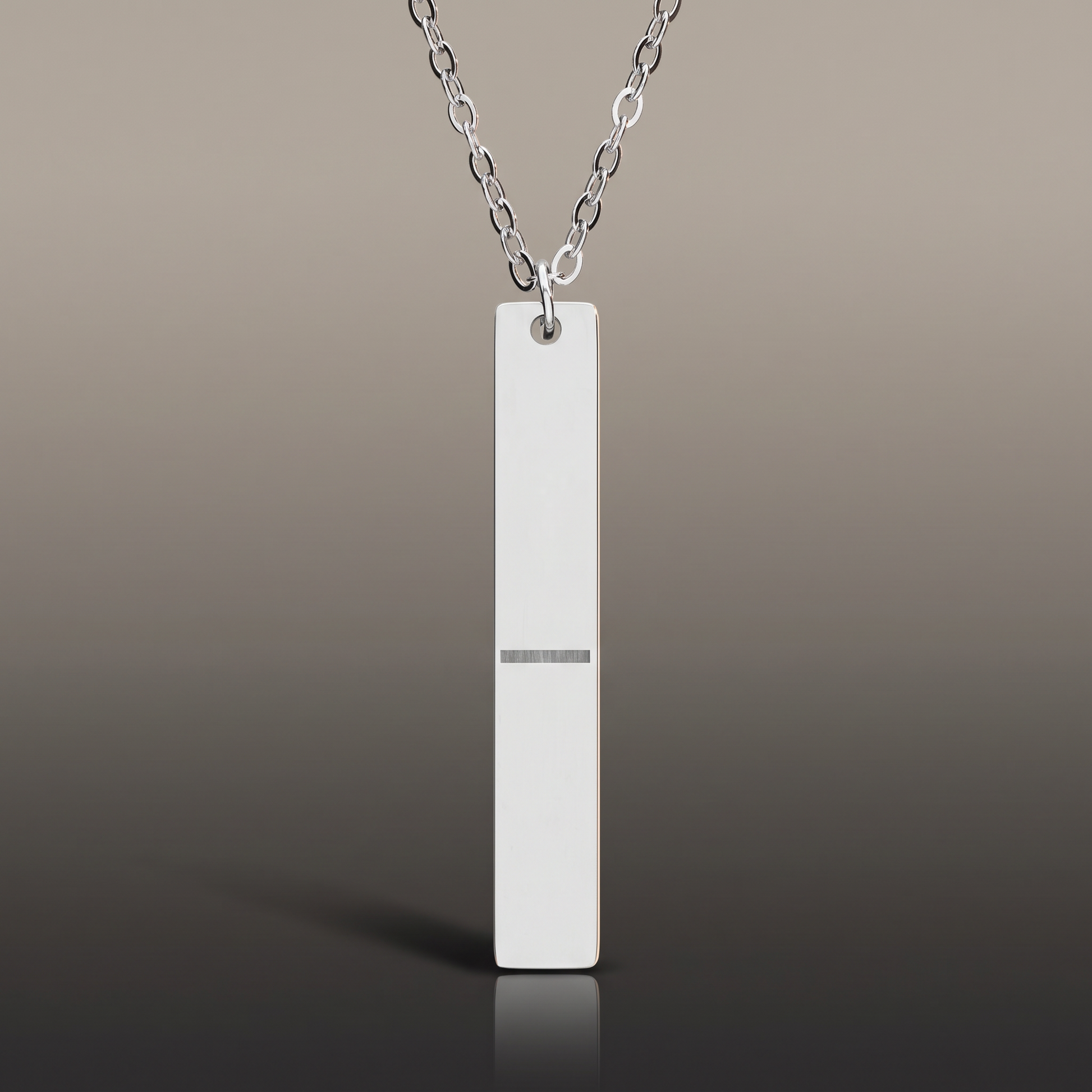 Engraved Vertical Bar Necklace on premium studio backdrop, high-contrast catalog shot