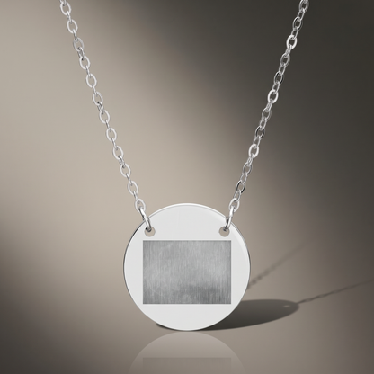 Engraved Circle Necklace on premium studio backdrop, high-contrast catalog shot