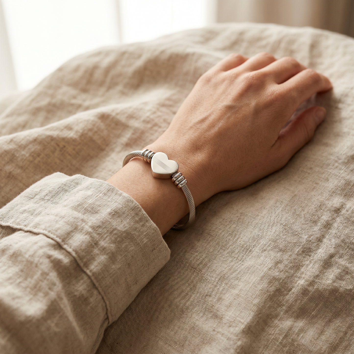 Engraved Heart Cuff Bracelet — worn on wrist